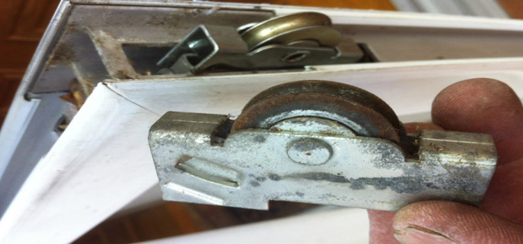 screen door roller repair in Country Club